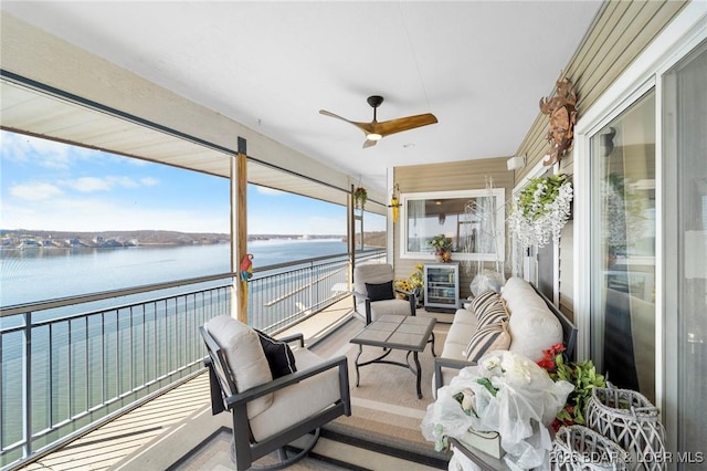 248 Palisades Condo Dr Unit 4A, Lake Ozark, MO 65049 - sunroom / solarium with a ceiling fan, a water view, and outdoor lounge area