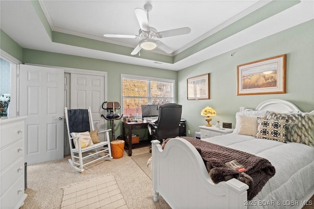 248 Palisades Condo Dr Unit 4A, Lake Ozark, MO 65049 - carpeted bedroom featuring ornamental molding, a closet, a desk, a ceiling fan, and a raised ceiling