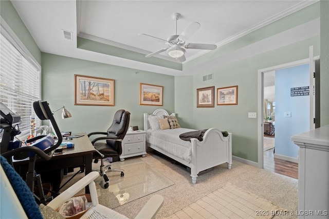 248 Palisades Condo Dr Unit 4A, Lake Ozark, MO 65049 - bedroom featuring a desk, ornamental molding, a tray ceiling, light carpet, and a ceiling fan