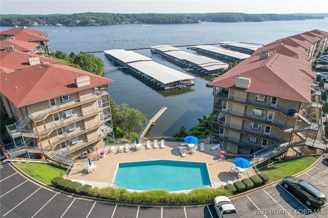 248 Palisades Condo Dr Unit 4A, Lake Ozark, MO 65049 - drone / aerial view of a large body of water and a pool area