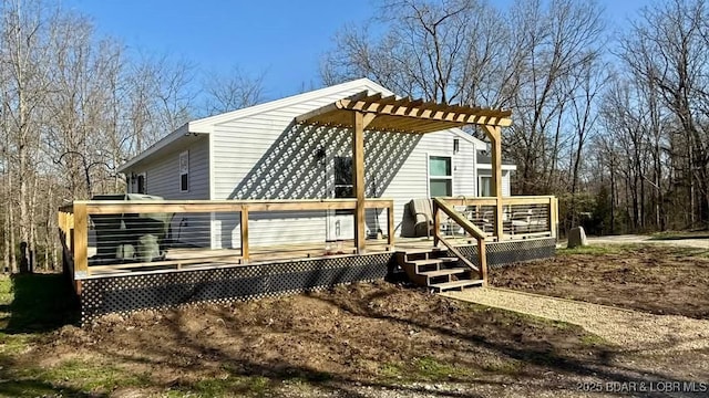 exterior space featuring a wooden deck
