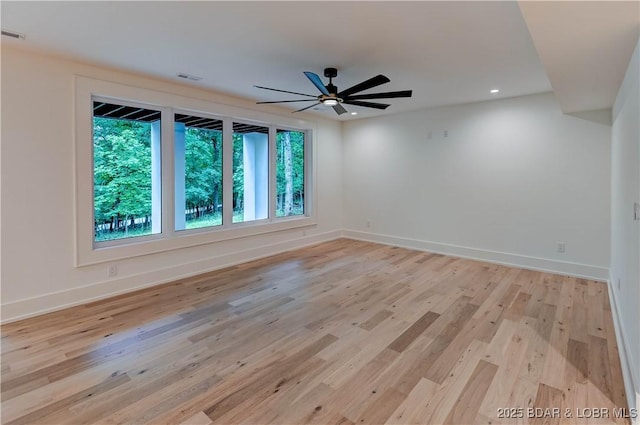 320 Via Appia Dr, Sunrise Beach, MO 65079 - unfurnished room with healthy amount of natural light, light wood-style flooring, baseboards, and recessed lighting