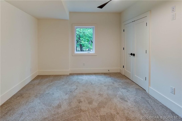 320 Via Appia Dr, Sunrise Beach, MO 65079 - unfurnished bedroom featuring carpet floors and baseboards