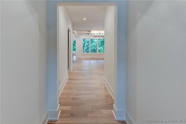 320 Via Appia Dr, Sunrise Beach, MO 65079 - corridor with a chandelier, light wood-type flooring, baseboards, and recessed lighting