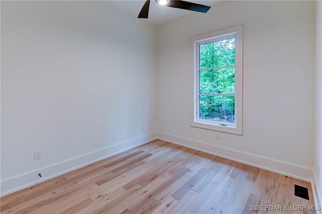 320 Via Appia Dr, Sunrise Beach, MO 65079 - unfurnished room with a ceiling fan, light wood finished floors, and baseboards