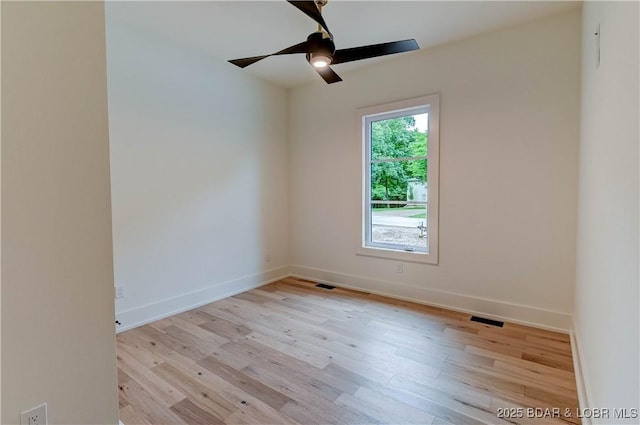 320 Via Appia Dr, Sunrise Beach, MO 65079 - empty room featuring light wood-style floors, a ceiling fan, and baseboards
