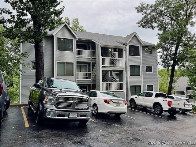 1505 Swiss Village Rd Unit A5, Osage Beach, MO 65065 - view of building exterior featuring uncovered parking
