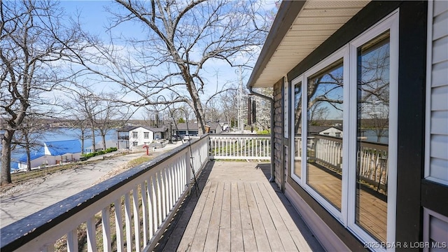 4645 Harbor Heights Ln, Osage Beach, MO 65065 - wooden deck featuring a residential view