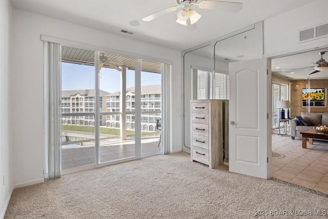1205 Lands End Pkwy Unit 533, Osage Beach, MO 65065 - bedroom featuring access to outside, light colored carpet, and baseboards