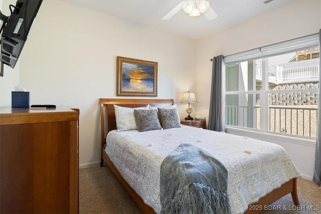 1205 Lands End Pkwy Unit 533, Osage Beach, MO 65065 - carpeted bedroom featuring baseboards and a ceiling fan