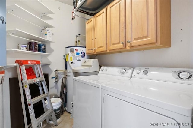 1205 Lands End Pkwy Unit 533, Osage Beach, MO 65065 - laundry area with washer and clothes dryer, water heater, cabinet space, and light tile patterned flooring