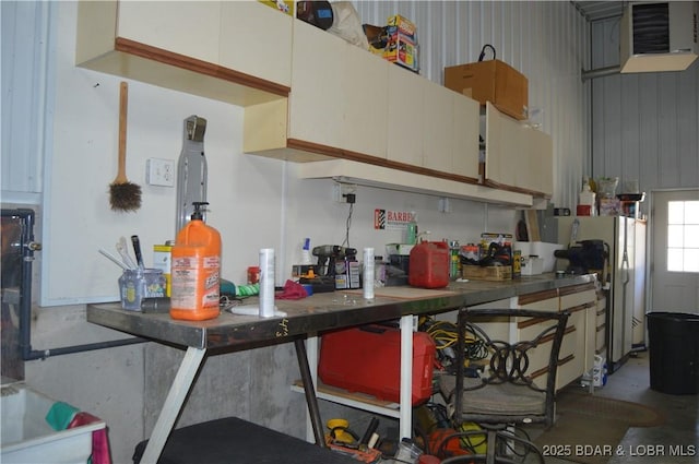 112 Rush Rd, Eldon, MO 65026 - kitchen with freestanding refrigerator and concrete flooring