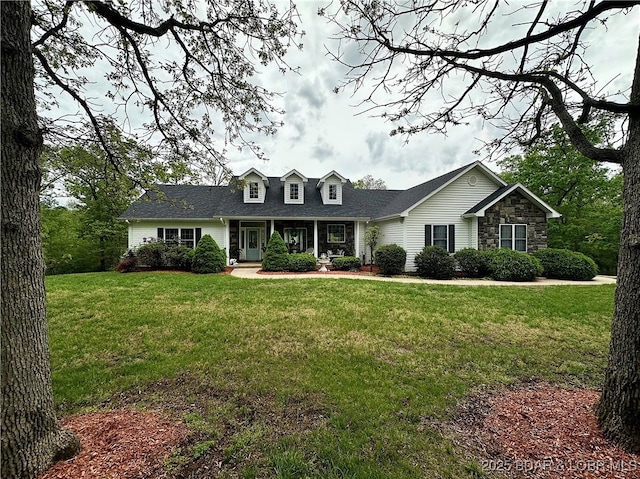 112 Rush Rd, Eldon, MO 65026 - cape cod home featuring a front yard and a porch