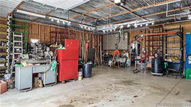 garage with a workshop area