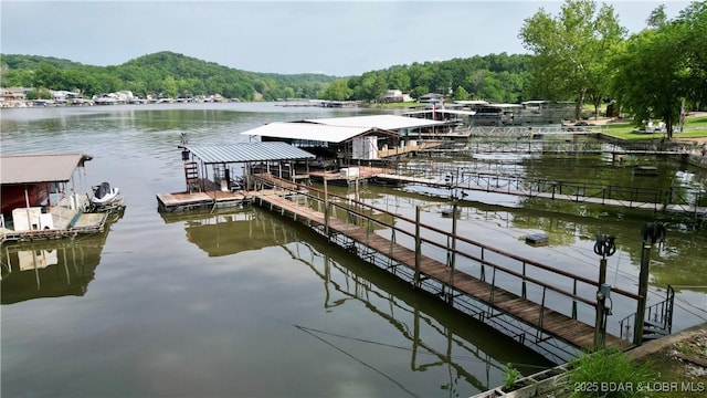 21 Ke Jo Point Rd, Gravois Mills, MO 65037 - dock featuring a forest view and a water view