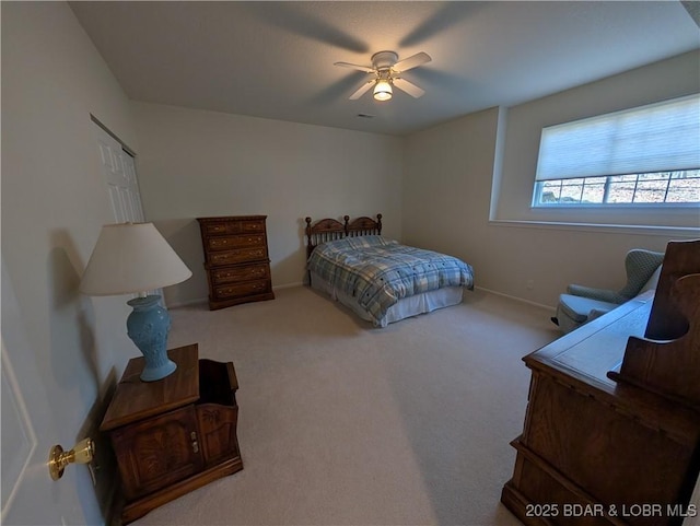 393 Crystal Springs Rd, Linn Creek, MO 65052 - carpeted bedroom featuring baseboards and a ceiling fan