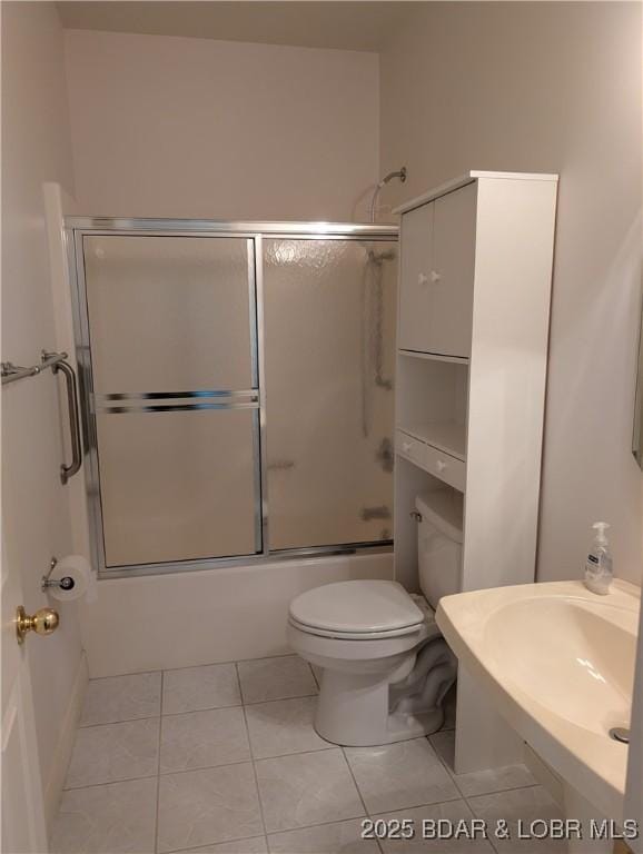 393 Crystal Springs Rd, Linn Creek, MO 65052 - full bathroom with bath / shower combo with glass door and tile patterned floors