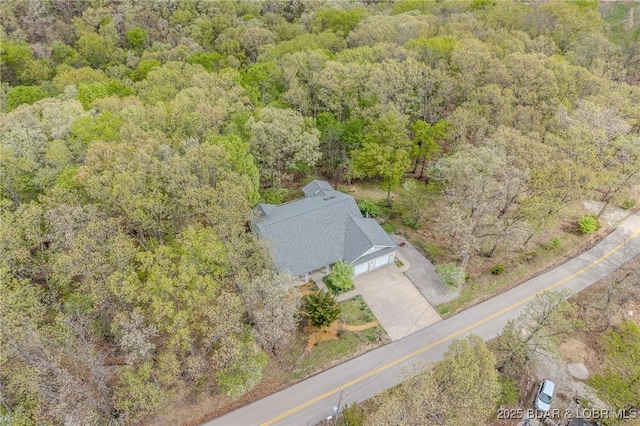 393 Crystal Springs Rd, Linn Creek, MO 65052 - view of subject property featuring a heavily wooded area