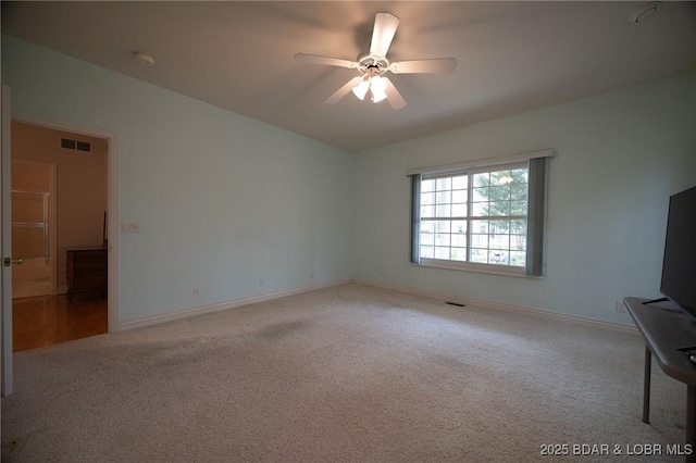 393 Crystal Springs Rd, Linn Creek, MO 65052 - unfurnished living room with carpet and a ceiling fan