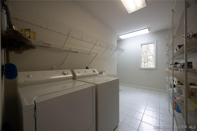 393 Crystal Springs Rd, Linn Creek, MO 65052 - washroom with washing machine and dryer, light tile patterned flooring, and stacked washer / dryer