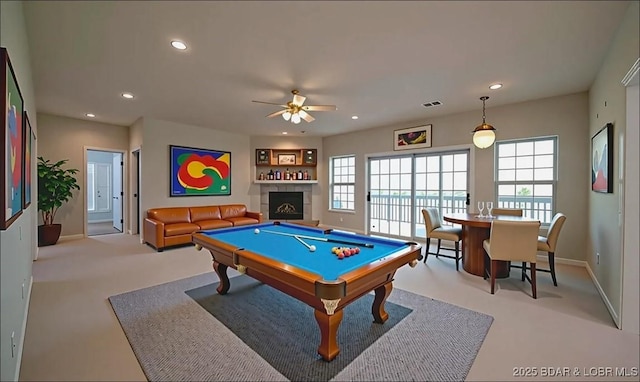 393 Crystal Springs Rd, Linn Creek, MO 65052 - recreation room with carpet, recessed lighting, a ceiling fan, pool table, and a fireplace