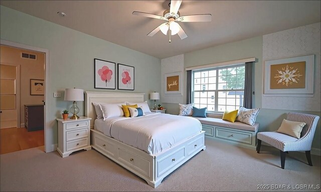 393 Crystal Springs Rd, Linn Creek, MO 65052 - bedroom with light carpet and a ceiling fan