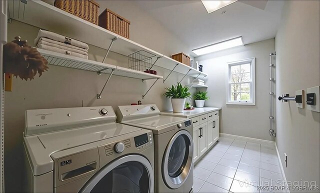 393 Crystal Springs Rd, Linn Creek, MO 65052 - laundry room with washing machine and clothes dryer, light tile patterned floors, and cabinet space