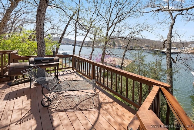 32785 Dixie Dr, Gravois Mills, MO 65037 - wooden terrace with a water view