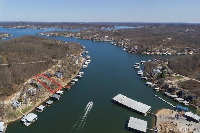 32785 Dixie Dr, Gravois Mills, MO 65037 - aerial view of property's location featuring a large body of water and property boundaries highlighted