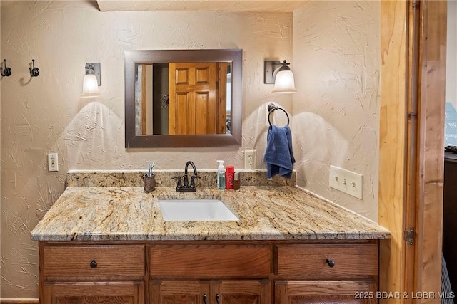 32785 Dixie Dr, Gravois Mills, MO 65037 - bathroom with vanity and a textured wall