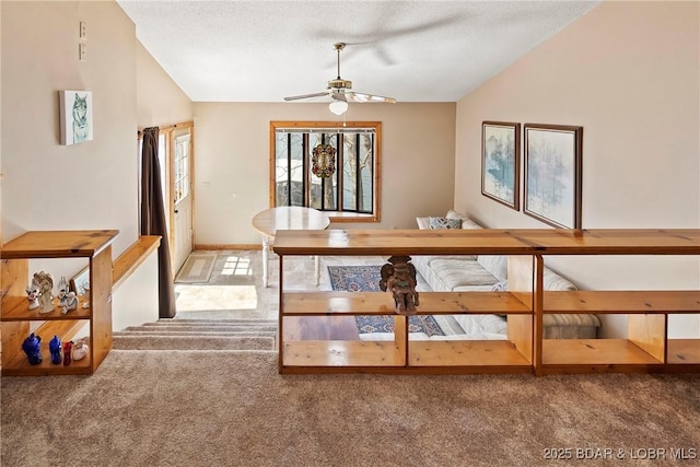 32785 Dixie Dr, Gravois Mills, MO 65037 - unfurnished dining area featuring carpet flooring, lofted ceiling, and ceiling fan