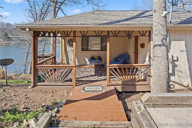 32785 Dixie Dr, Gravois Mills, MO 65037 - doorway to property with a shingled roof