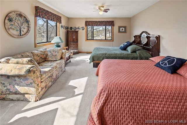 32785 Dixie Dr, Gravois Mills, MO 65037 - bedroom featuring carpet flooring, multiple windows, and a ceiling fan