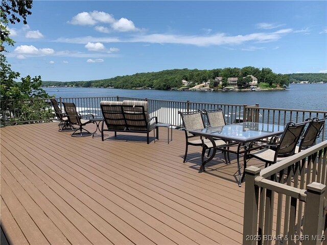 28783 Morgan Hills Rd, Gravois Mills, MO 65037 - deck featuring outdoor dining space and a water view