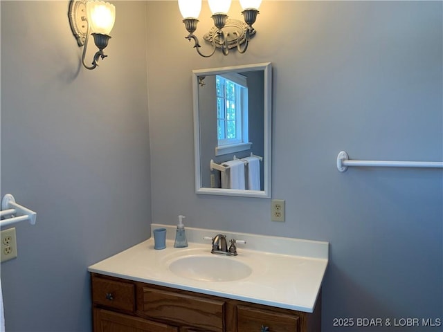 28783 Morgan Hills Rd, Gravois Mills, MO 65037 - bathroom with vanity and an inviting chandelier