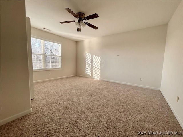 1148 Sweetwater Dr, Four Seasons, MO 65049 - unfurnished room with baseboards, carpet, ceiling fan, and visible vents