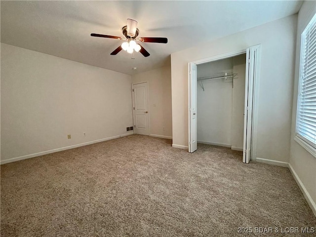 1148 Sweetwater Dr, Four Seasons, MO 65049 - unfurnished bedroom featuring ceiling fan, light carpet, baseboards, visible vents, and a closet