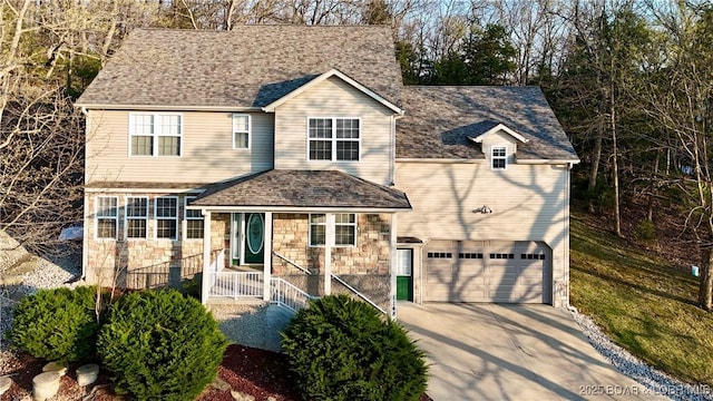 1148 Sweetwater Dr, Four Seasons, MO 65049 - traditional-style home with a garage, roof with shingles, driveway, and stone siding