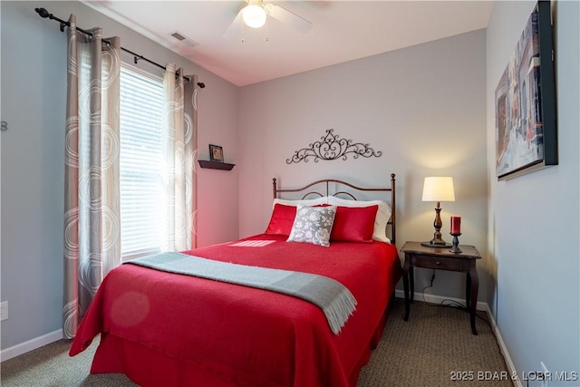 275 Flynn Rd Unit 205, Lake Ozark, MO 65049 - bedroom with carpet, visible vents, baseboards, and a ceiling fan