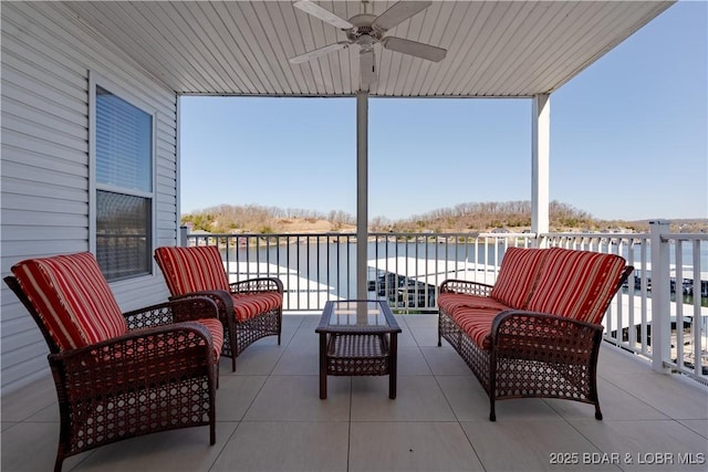 275 Flynn Rd Unit 205, Lake Ozark, MO 65049 - view of patio with a water view, an outdoor living space, and ceiling fan