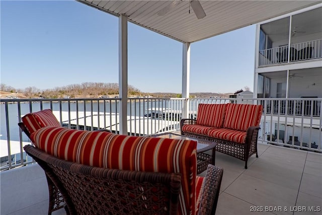 275 Flynn Rd Unit 205, Lake Ozark, MO 65049 - view of patio / terrace featuring a water view and a ceiling fan