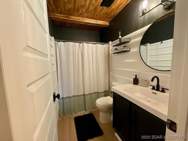 bathroom featuring curtained shower, wooden ceiling, toilet, vanity, and wood finished floors