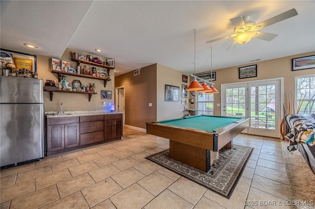 rec room featuring indoor wet bar, billiards, recessed lighting, light tile patterned flooring, and a sink