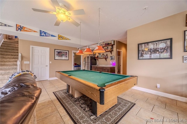 recreation room with baseboards, billiards, a ceiling fan, and light tile patterned flooring
