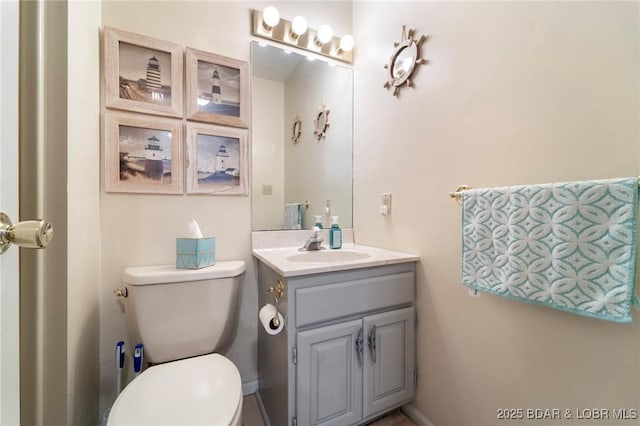 70 Ravenwood Dr, Lake Ozark, MO 65049 - half bath featuring vanity and toilet