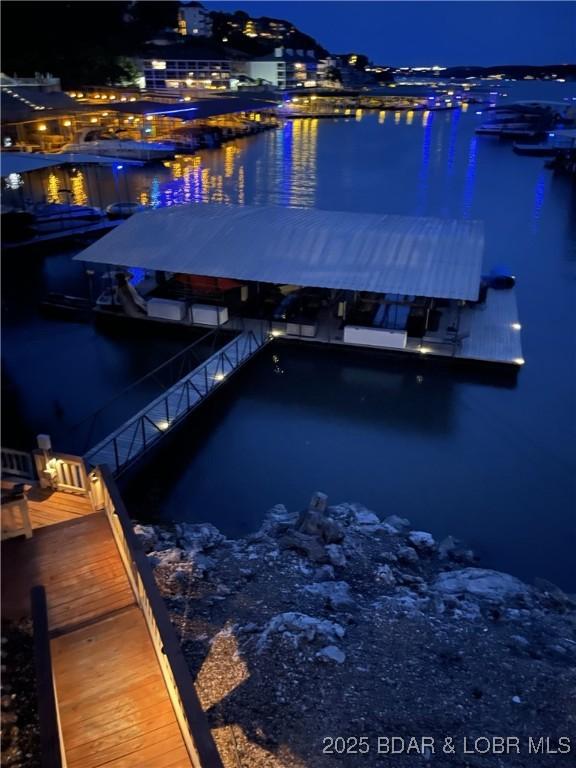 70 Ravenwood Dr, Lake Ozark, MO 65049 - dock featuring a water view