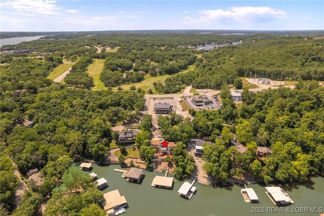 70 Ravenwood Dr, Lake Ozark, MO 65049 - drone / aerial view of a heavily wooded area and a nearby body of water