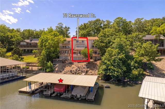 70 Ravenwood Dr, Lake Ozark, MO 65049 - dock area with boat lift and a water view