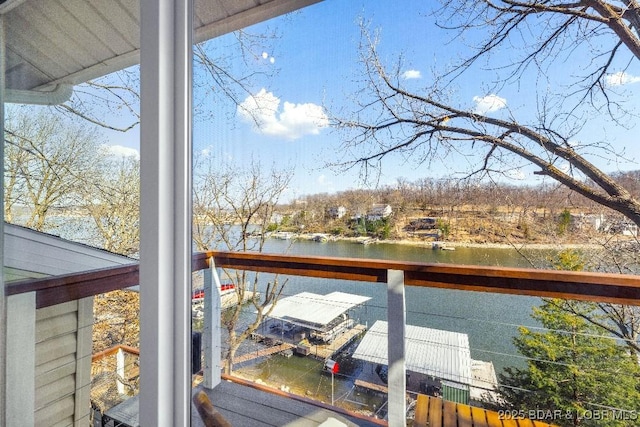 balcony featuring a water view