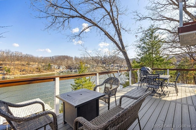 deck featuring a water view